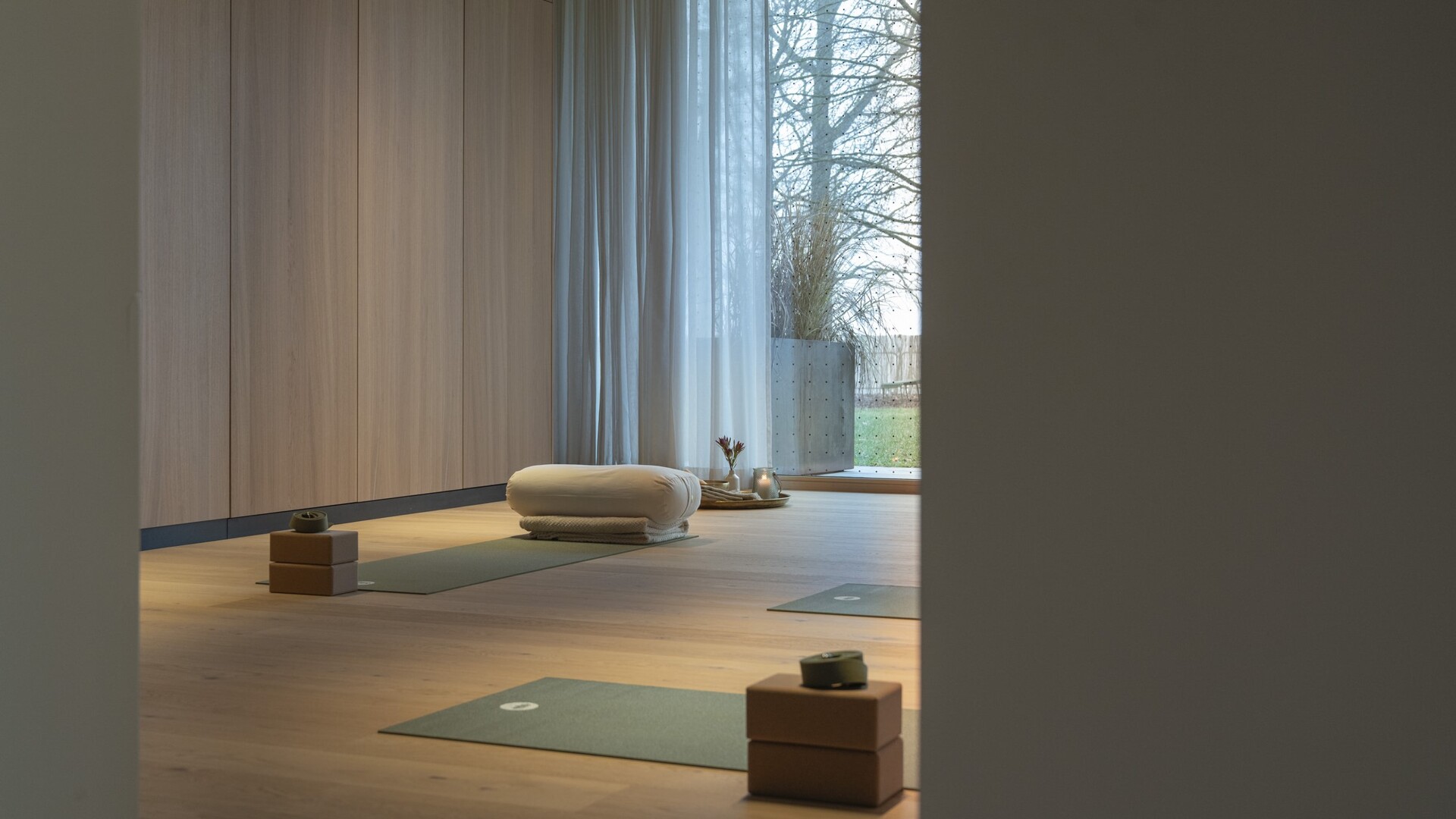 Yoga room with a view of the garden at Seegut Zeppelin